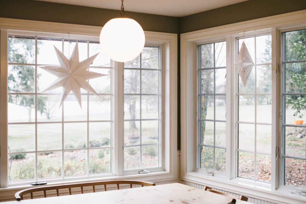 Image of a Swedish Cottage Christmas dining room with paper stars