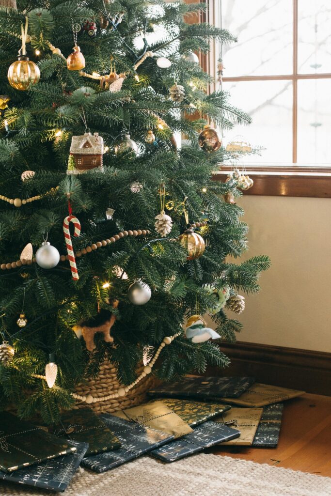 Image of a Cottage Christmas tree with presents underneath