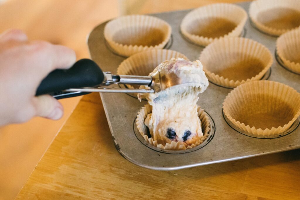 Image of a scoop of Einkorn Blueberry Muffin batter